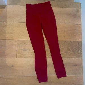 Lululemon Fast and Free 25 in Red leggings.